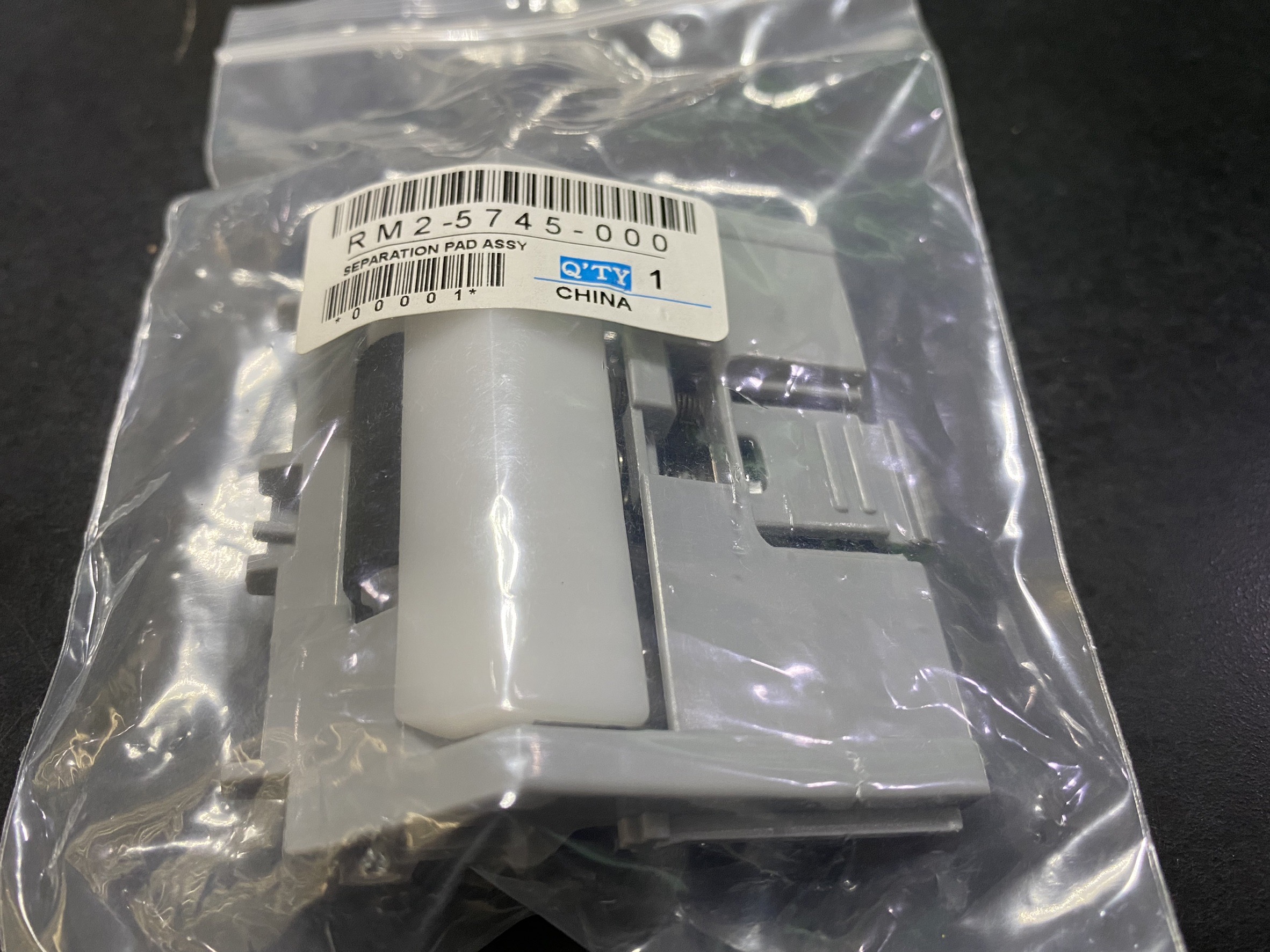HP/CANON RM2-5745-000SE PARATION ROLLER ASSY TRAY2 FOR HP M501/M506/M527/M528/E50045/E50145/E52545/E52645/CANON LBP312/323/324/325/MF521/522/525 500 กรัม