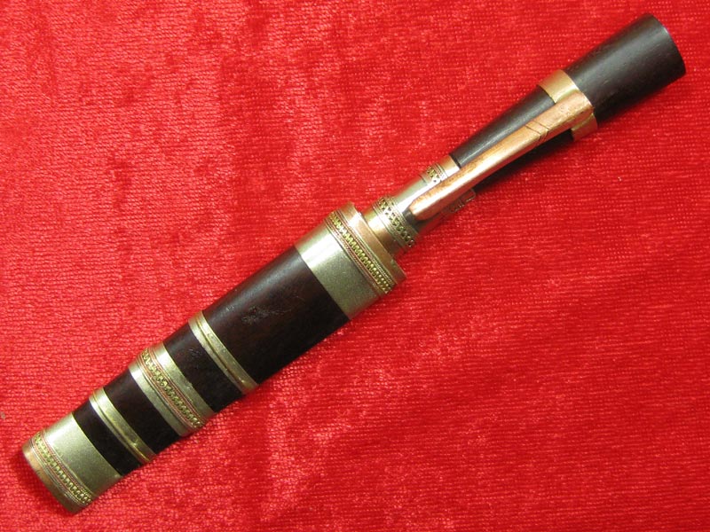 (13) มีดหมอหลวงพ่อคูณ วัดบ้านไร่ ปี 36 (ด้ามไม้ฝักไม้) ออกที่วัดประโดก อ.เมืองนครราชสีมา ปี 2536