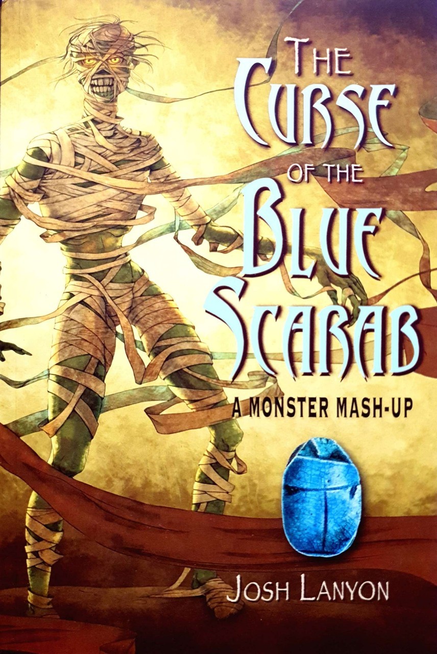 The Curde of the Blue Scarab = A Monster Mash - Up : Josh Lanyon