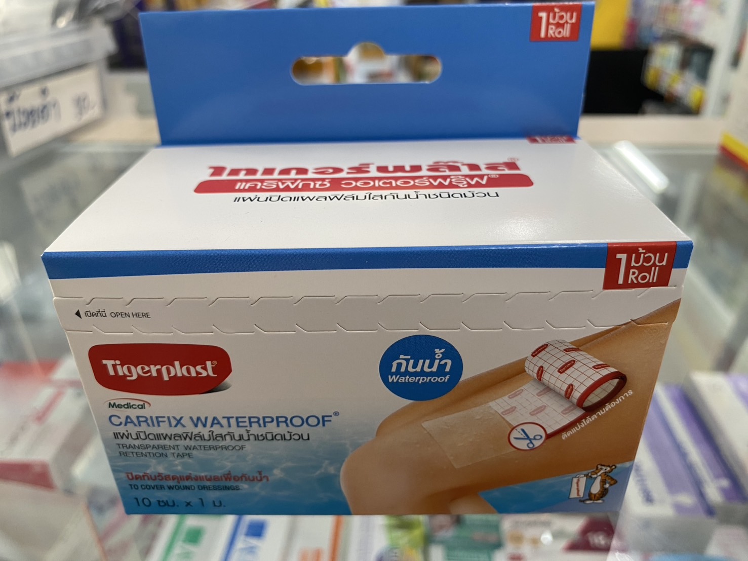 Tigerplast Carifix Waterproof แผ่นปิดแผลชนิดฟิล์มใสกันน้ำ 1 กล่องมี 1 ม้วน