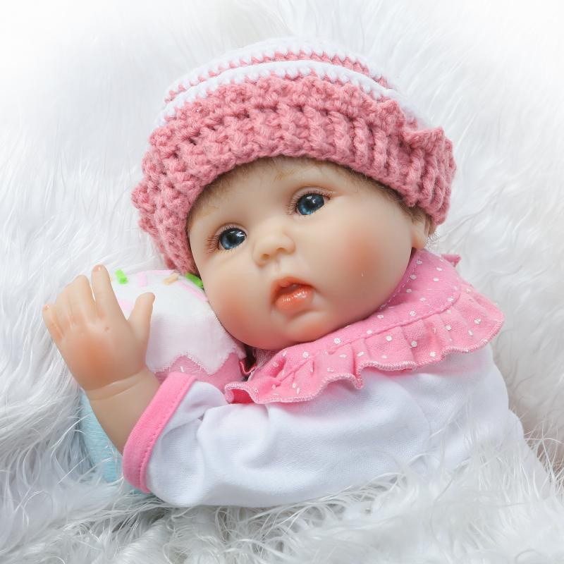ตุ๊กตา reborn Doll ตุ๊กตาเด็กทารกจำลองสวมหมวกถักไหมพรมสีชมพู น้อง Belinda ตุ๊กตาจำลองเด็กทารกเสมือนจริง เด็กแรกเกิด