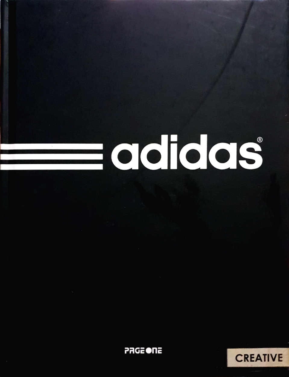 THE HISTORY OF ADIDAS Hardcover Brands A-Z is a series