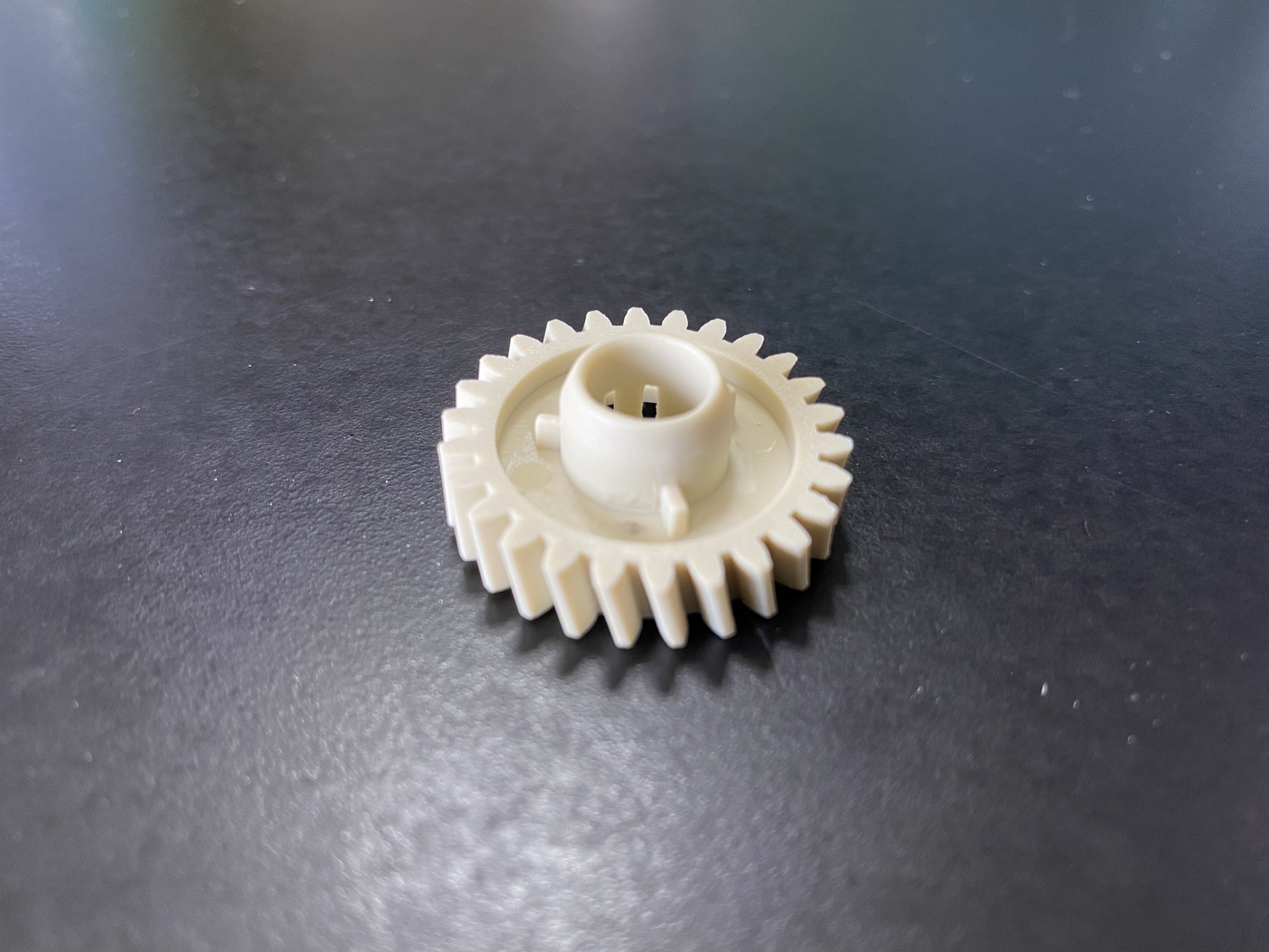 RU7-0139-000 เฟืองลูกยางความร้อน(เฟืองเฉียง)PRESSURE ROLLER GEAR 26T FOR HP P1536/P1560/P1566/P1606/M201/M202/M225/M226 500 กรัม