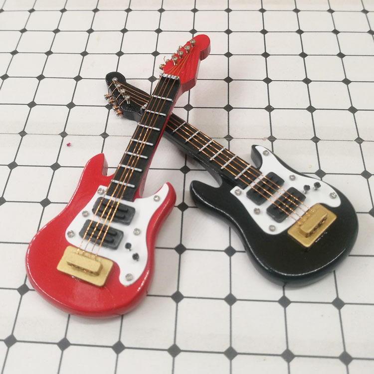 guitar กีตาร์จิ๋วสีดำสำหรับนักสะสมของจิ๋วและผู้ที่รักในดนตรีเสียงเพลงชุดกีตาร์เหมาะแก่การสะสมให้ทรงคุณค่า