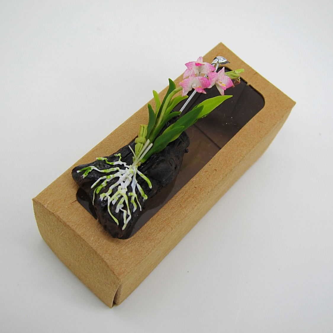 Orchids on log hanging