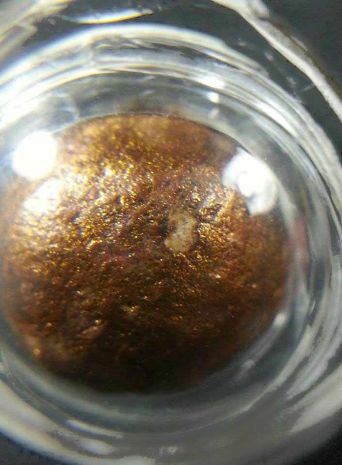 ลูกอมผงพรายกุมาร บรอนซ์วานิช (บรอนซ์น้ำมัน) เนื้อขาวเลี่ยมกันน้ำพร้อมบูชา