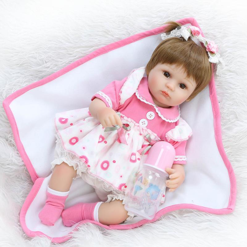 ตุ๊กตารีบอร์นน้องbaby npk doll ธีมชุดชมพูนั่งได้พร้อมขวดนมและใบเกิด น้องไลลา REBORN DOLL LAYLA
