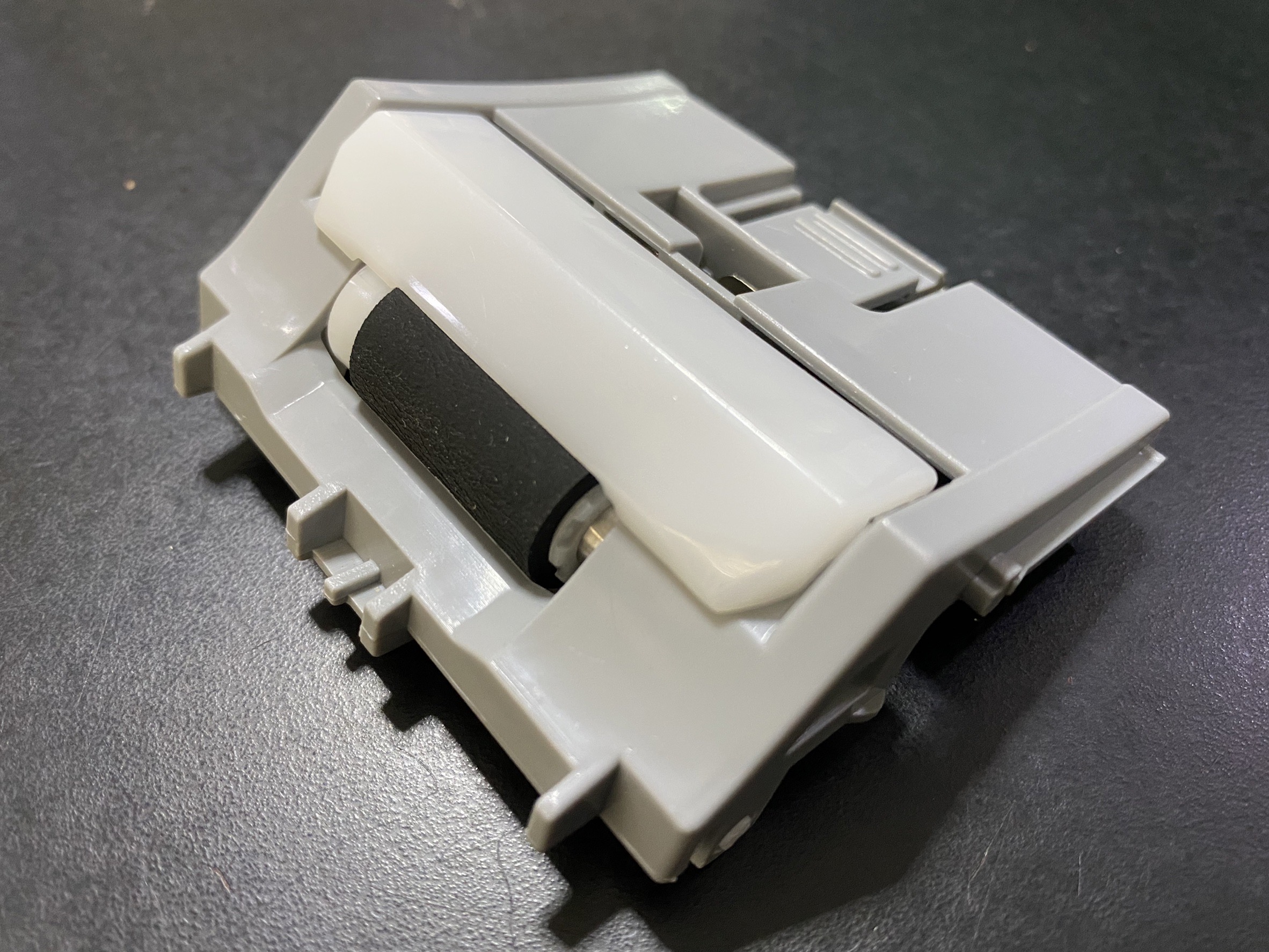 HP/CANON RM2-5745-000SE PARATION ROLLER ASSY TRAY2 FOR HP M501/M506/M527/M528/E50045/E50145/E52545/E52645/CANON LBP312/323/324/325/MF521/522/525 500 กรัม