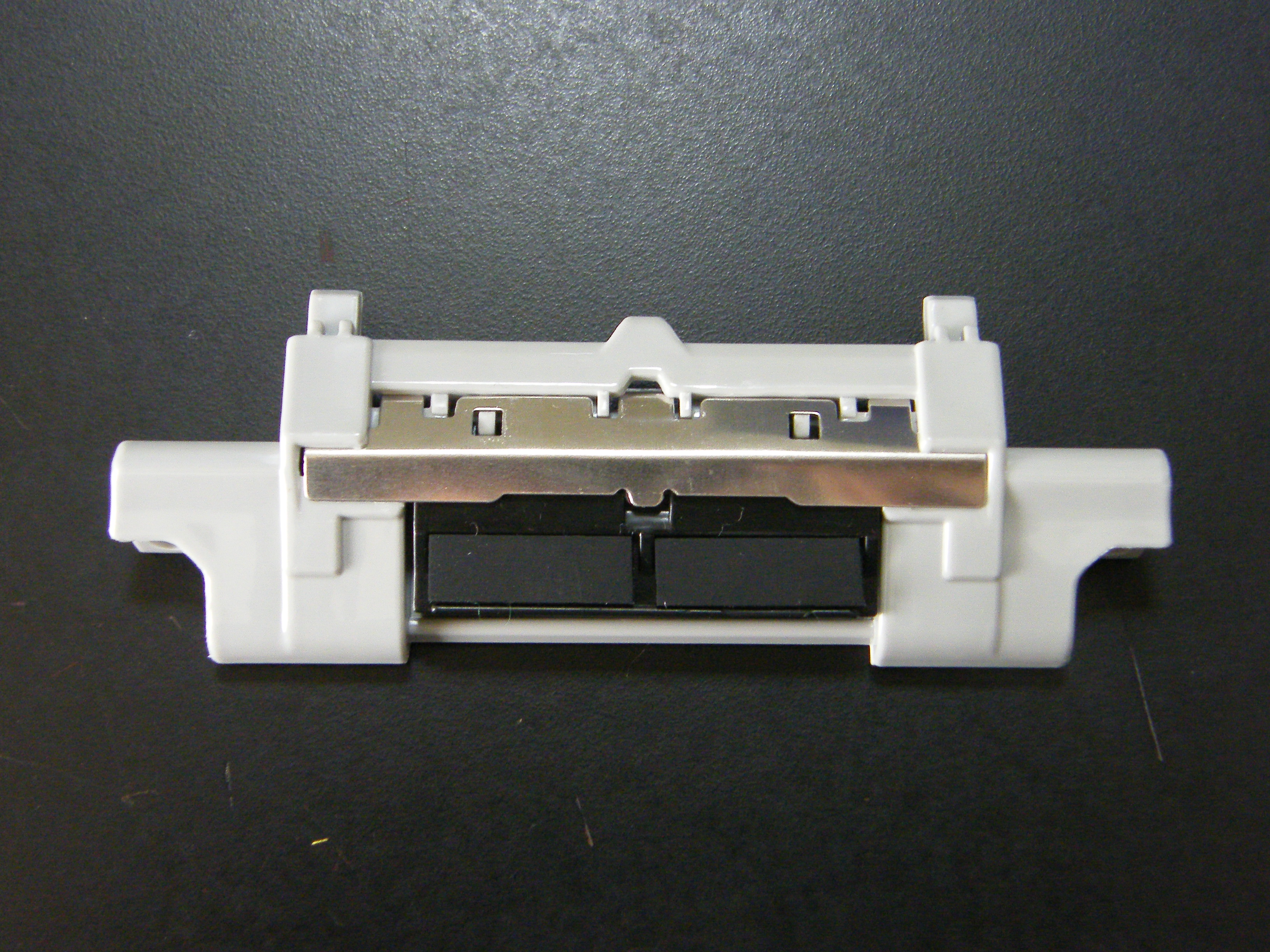 RM1-6397-000 SEPARATION PAD HOLDER ASSEMBLY FOR HP P2035/P2055/M400/M401/M425/CANON LBP251/253/6300/MF411/412 500 กรัม