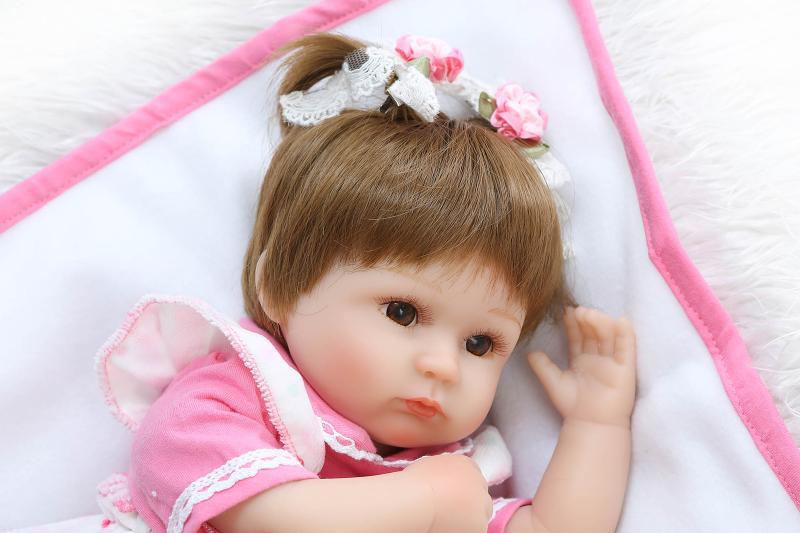 ตุ๊กตารีบอร์นน้องbaby npk doll ธีมชุดชมพูนั่งได้พร้อมขวดนมและใบเกิด น้องไลลา REBORN DOLL LAYLA