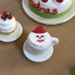 Tiny coffee cup with saucer