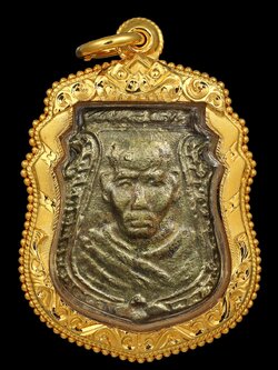 เหรียญหล่อหน้าเสือ ลพ.น้อย วัดธรรมศาลา รุ่นสร้างสะพาน พิมพืสองหน้า ปี2510 เนื้อทองเหลือง สภาพสวยเดิม เลี่ยมทองแท้ อย่างหนาพร้อมบุชา